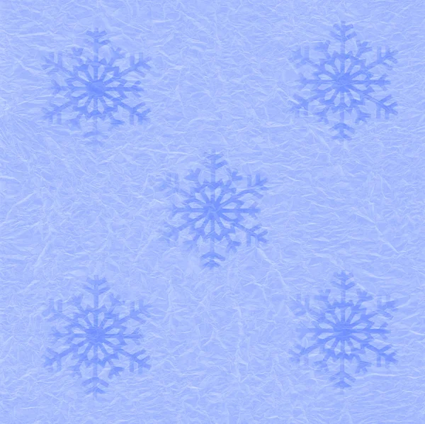 Feestelijke blauw papier verpakking met sneeuwvlokken voor achtergrond — Stockfoto