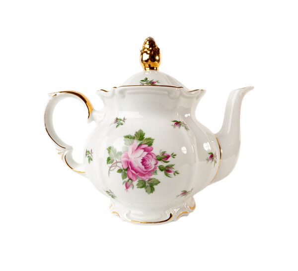 Porcelain teapot with a pattern of roses and gold in classic style isolated on white