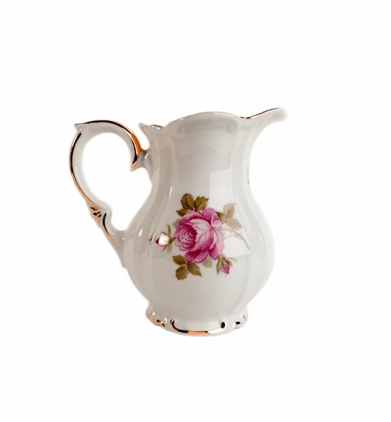 Keramický džbán mléko nebo smetanu s vzorem růží a zlata v klasickém stylu — Stock fotografie