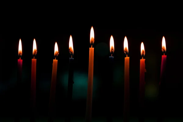 Candele Chanukah di fila Immagine Stock