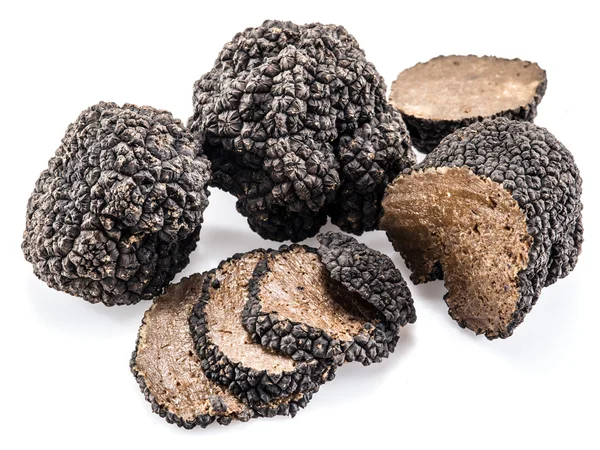 Black truffles isolated on a white background. — Stock Photo, Image