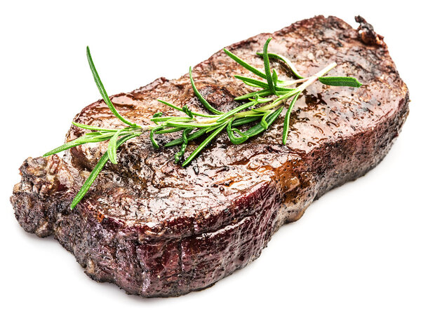 Steak Ribeye with spices on the white background.