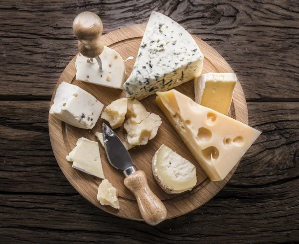 Variety of cheeses. Vintage stiles. — Stock Photo, Image