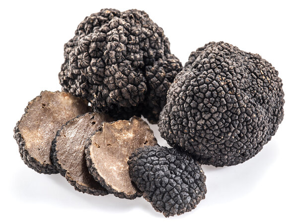 Black truffles isolated on a white background.