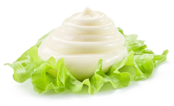 Natural mayonnaise sauce on the salad leaf. — Stock Photo, Image