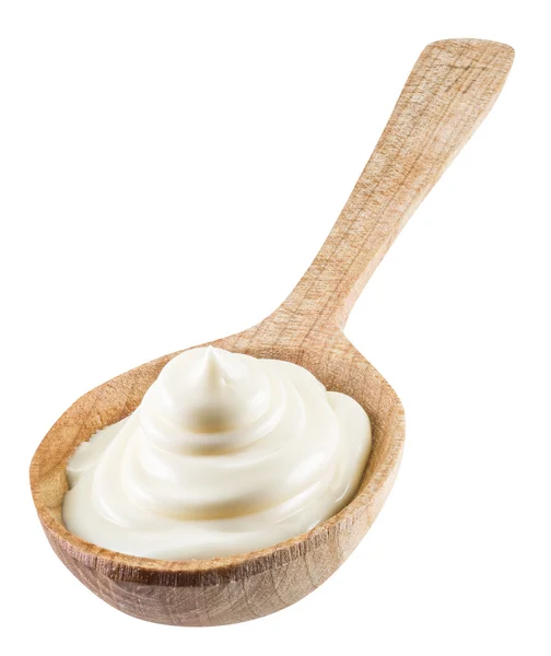 Mayonnaise swirl in the wooden spoon. File contains clipping pat — Stock Photo, Image