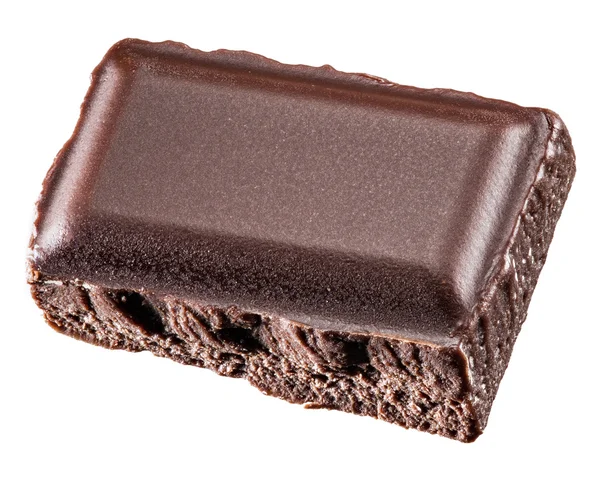 Ένα κομμάτι σοκολάτα που απομονώνονται σε λευκό φόντο. — Φωτογραφία Αρχείου