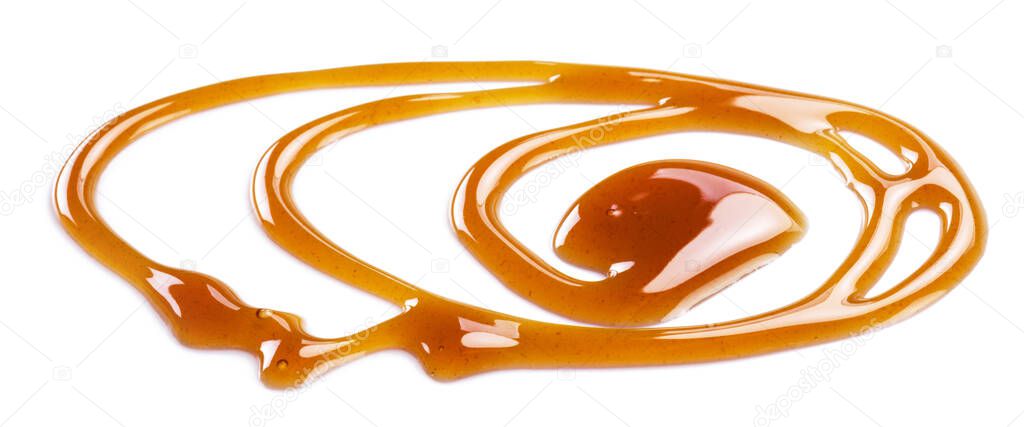 Sweet sugar caramel sauce curls isolated on white background. Top view.
