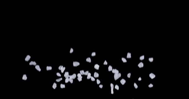Krystaly Mořské Soli Pomalu Létají Nahoru Padají Černé Pozadí Blackmagic — Stock video