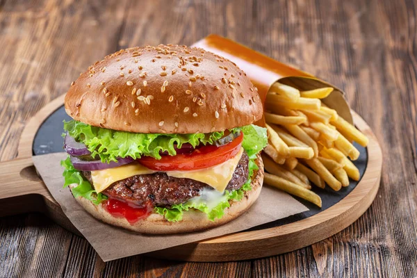 Delicious Burger Potato Fries Wooden Table Dark Brown Background Fast — Stock Photo, Image