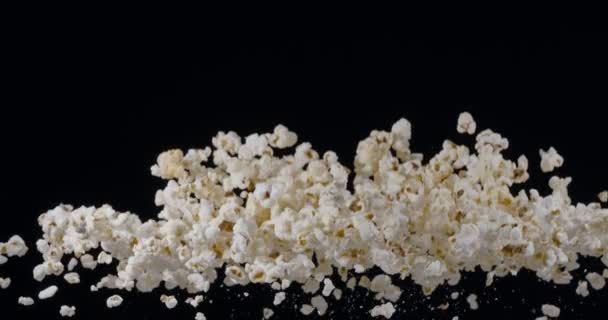 Popcorn Flakes Slowly Rise Fall Black Background Blackmagic Ursa Pro — Stock Video