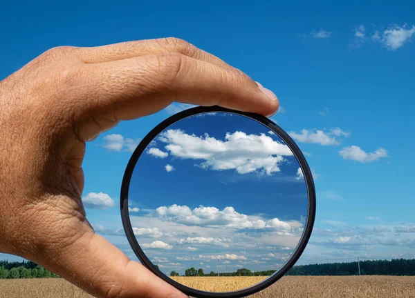 Effect of a polarizing filter shown on the photo of the sky. The picture of the clouds is higher contrast through the filter.