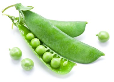 Fresh peas are contained within a pod. clipart