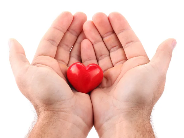 Rotes Herz in männlichen Händen. — Stockfoto