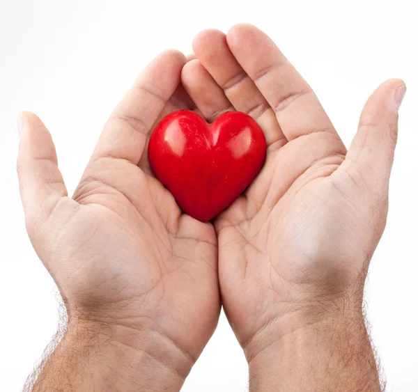 Red heart in male hands. — Stock Photo, Image