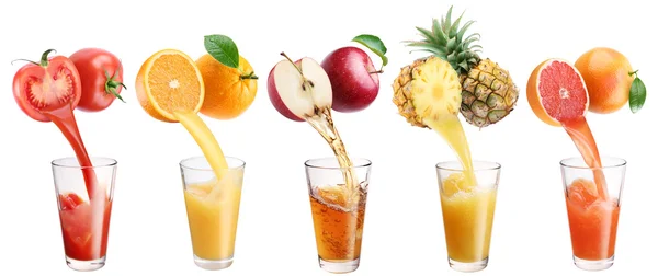 Fresh juice pours from fruits and vegetables in a glass. — Stock Photo, Image