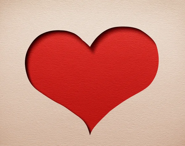 Heart cutout in paper. Red background inside. — Stock Photo, Image
