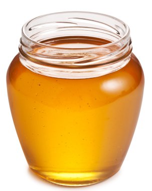 Açılan cam bal dolu.