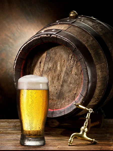 Pin of beer and glass of beer. Royalty Free Stock Photos