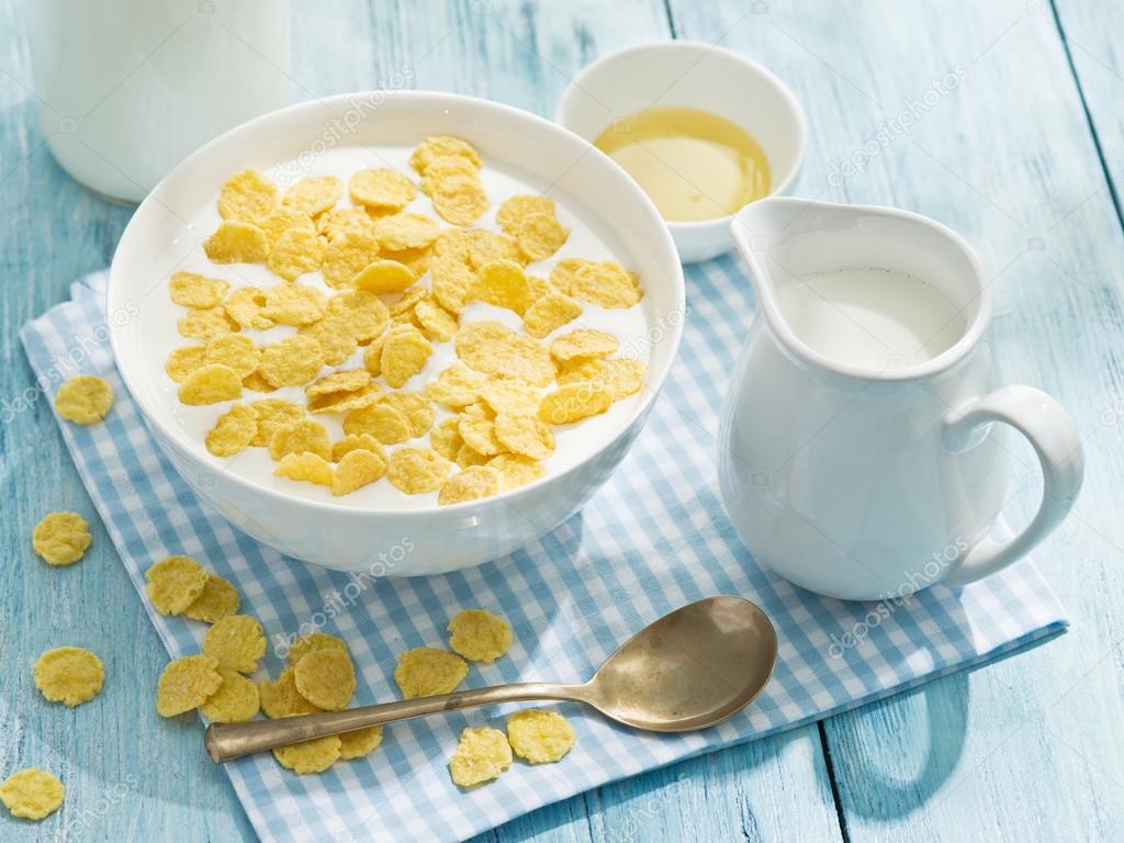 Cornflakes cereal and milk.