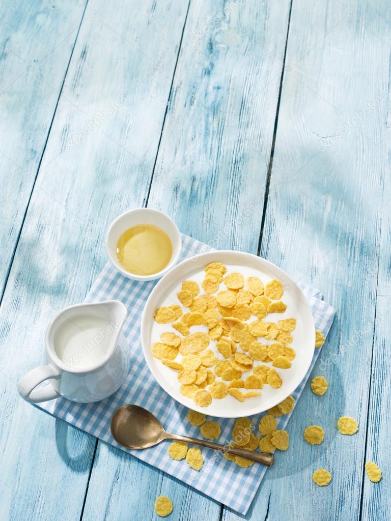 Cornflakes cereal and milk.