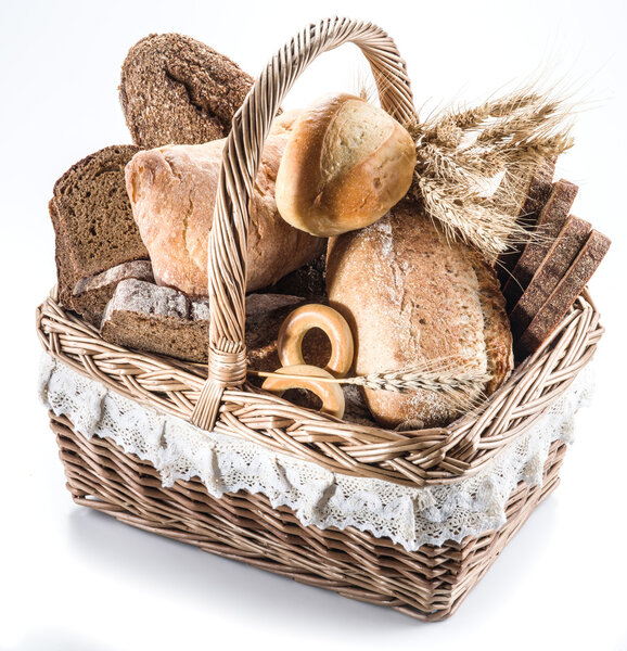 Different types of bread in the basket.