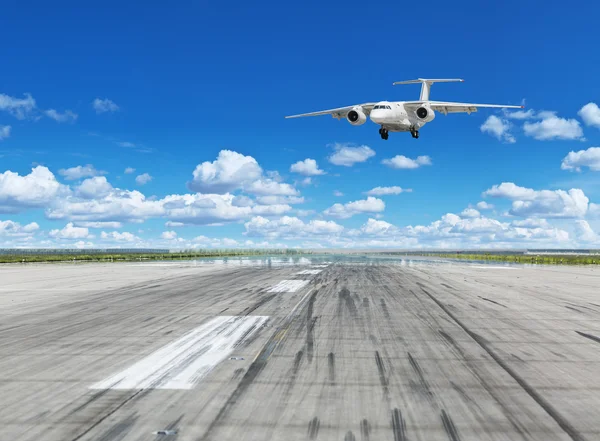 Airplane landing on runaway in the airport. — Stock Photo, Image