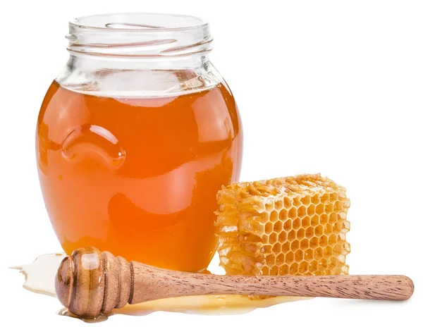 Frasco cheio de mel fresco e favos de mel. Imagem de alta qualidade . — Fotografia de Stock