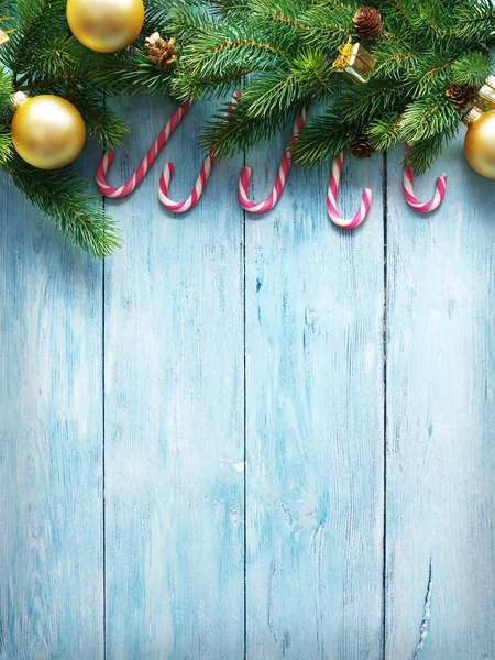 Christmas decoration with fur and baubles — Stock Photo, Image