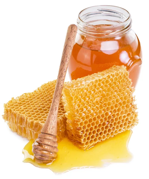 Frasco cheio de mel fresco e favos de mel. Imagem de alta qualidade . — Fotografia de Stock