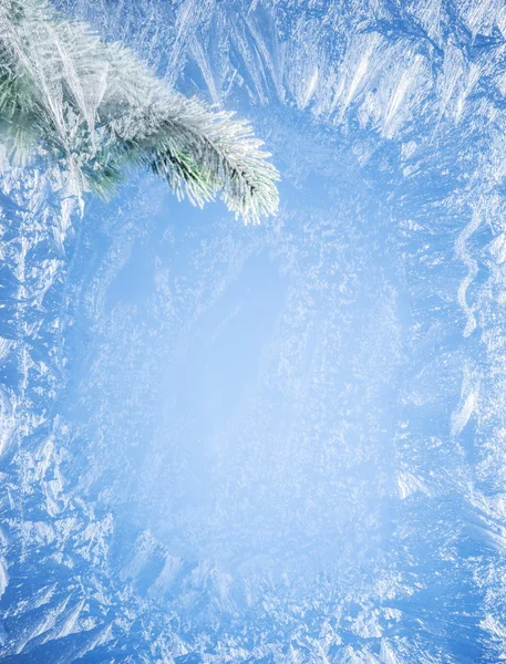 Frosty patterns on the edge of a frozen window. — Stock Photo, Image