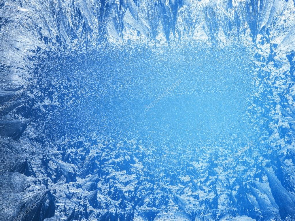 Frosty patterns on the edge of a frozen window. Stock Photo by  ©Valentyn_Volkov 90867654