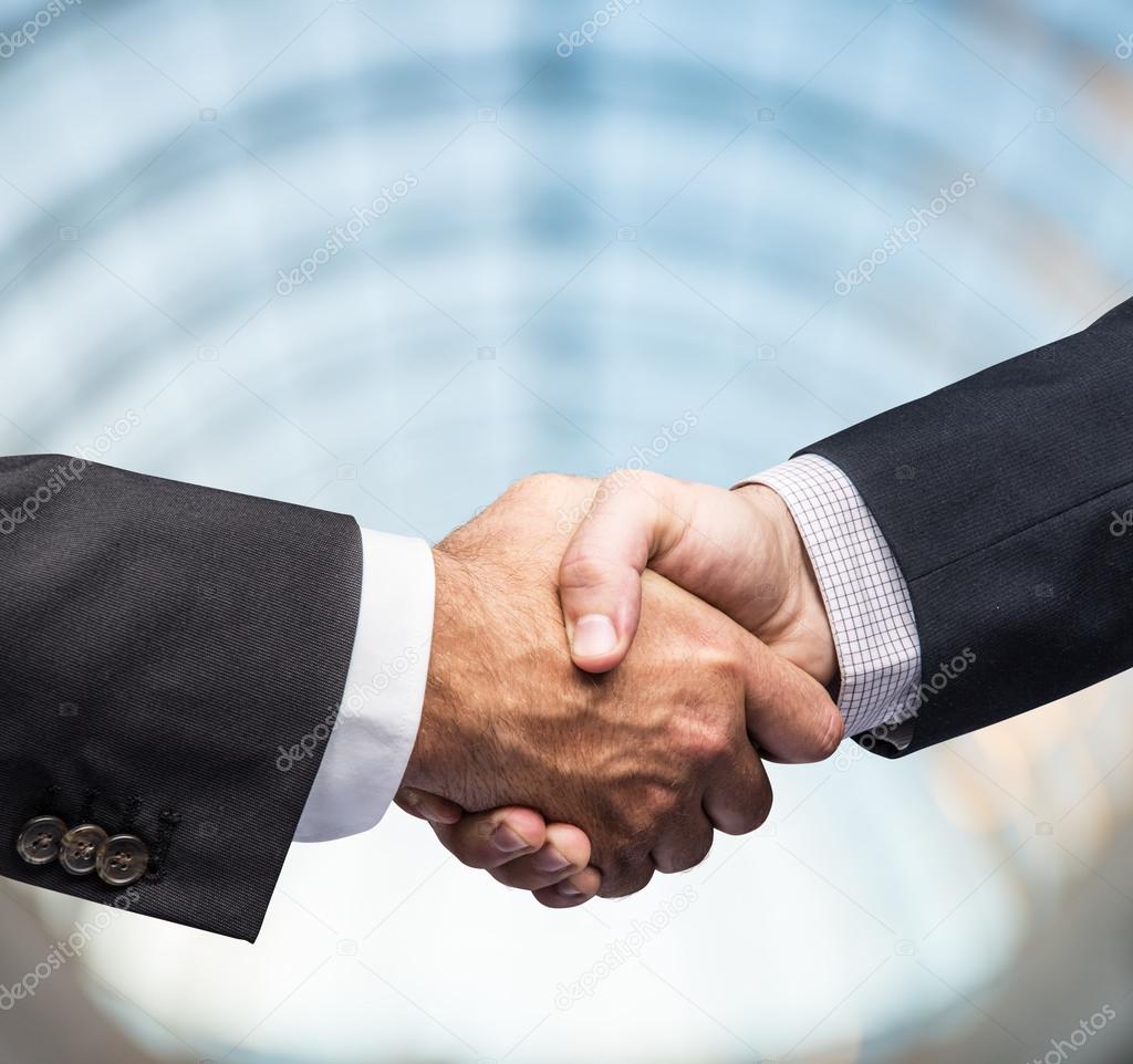 Handshake. Closeup shot of hands.