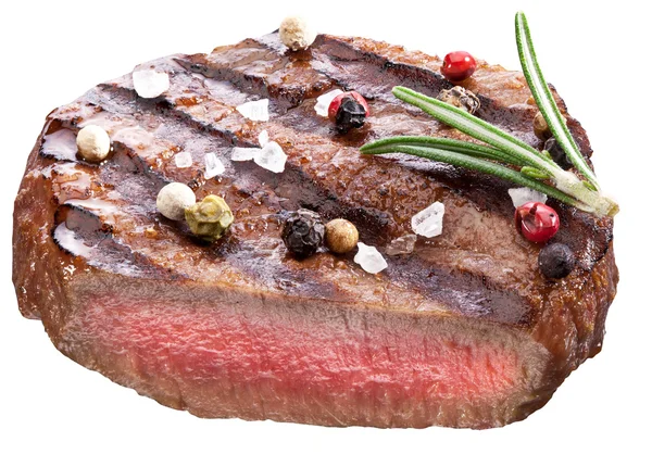 Beef steak with spices on a white background. — Stock Photo, Image