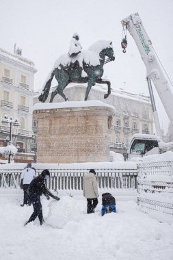 Storm called Filomena in Madrid, a storm with a lot of snow and wind has made the people of Madrid go out to the centre of Madrid to observe the incredible change of landscape in their city clipart