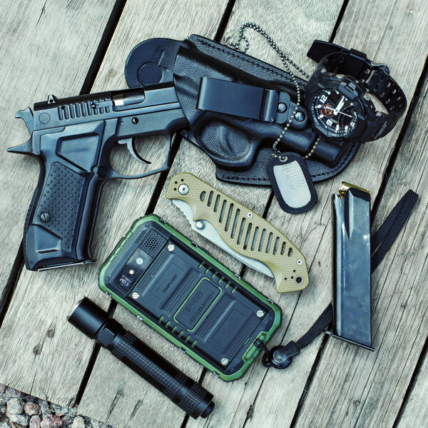 gun, smartphone, torch, watches and knife