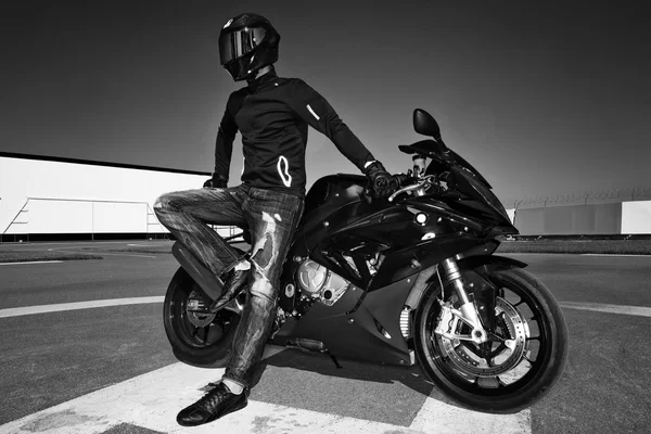 Man in helmet on motorcycle