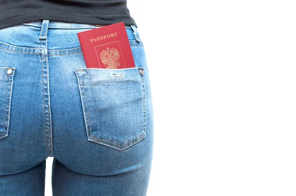 Passport in the pocket of jeans girl — Stock Photo, Image