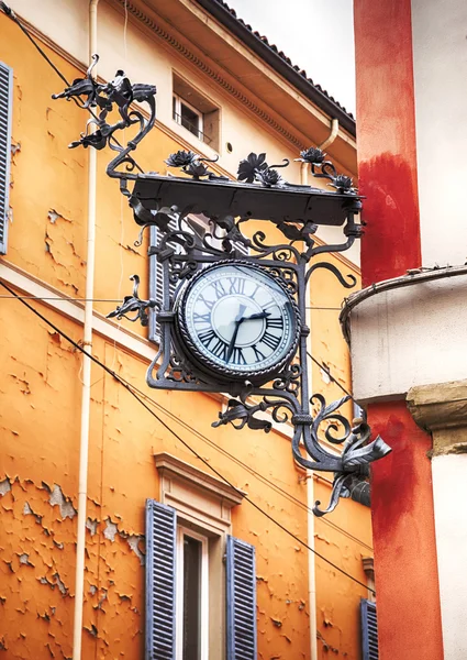 street clock as decorative element in Bologna