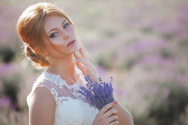 Beautiful Bride in wedding day in lavender field — Stock Photo, Image