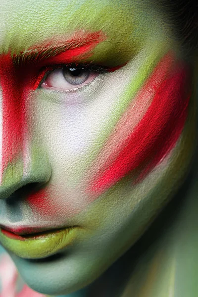 Beautiful fashion woman with bright color face art and body art. Paint on face. Creative portrait — Stock Photo, Image