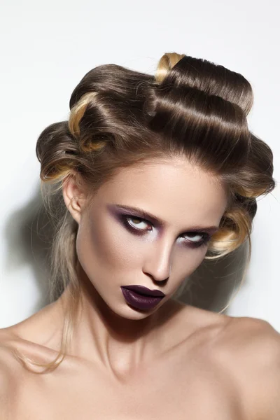 Creative closeup of a beautiful fashion model with colorful makeup — Stock Photo, Image