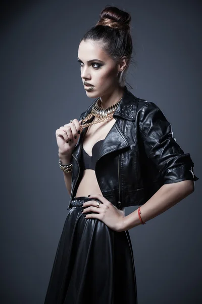 Gorgeous beautiful sexy woman in a leather clothes — Stock Photo, Image