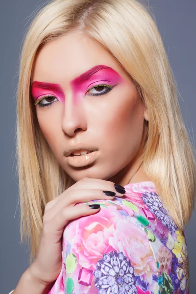 Fashion blonde supermodel in pink dress, closeup studio shot — Stock Photo, Image