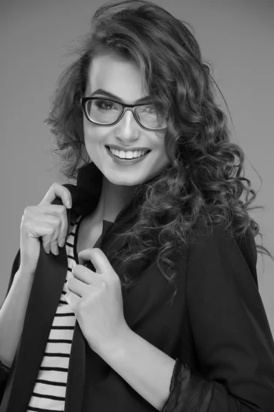 Close-up portrait of beautiful young woman in glasses — Stock Photo, Image