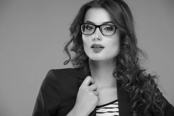 Close-up portrait of beautiful young woman in glasses — Stock Photo, Image