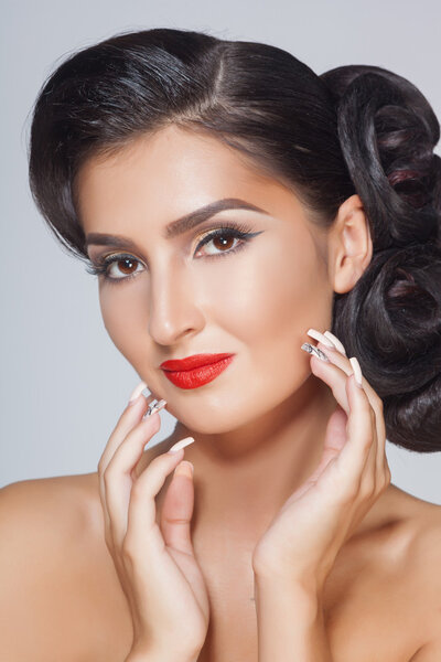 Beautiful bride with fashion hairstyle and make-up