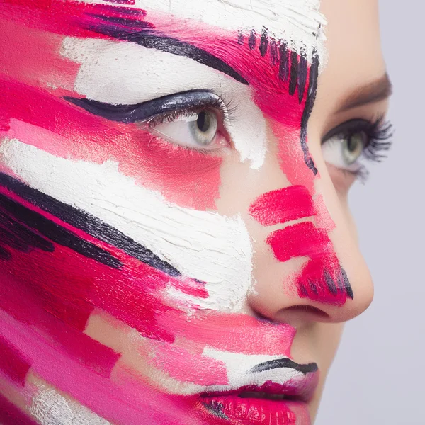 Beautiful fashion woman with bright color face art and body art. Paint on face.  Creative portrait — Stock Photo, Image