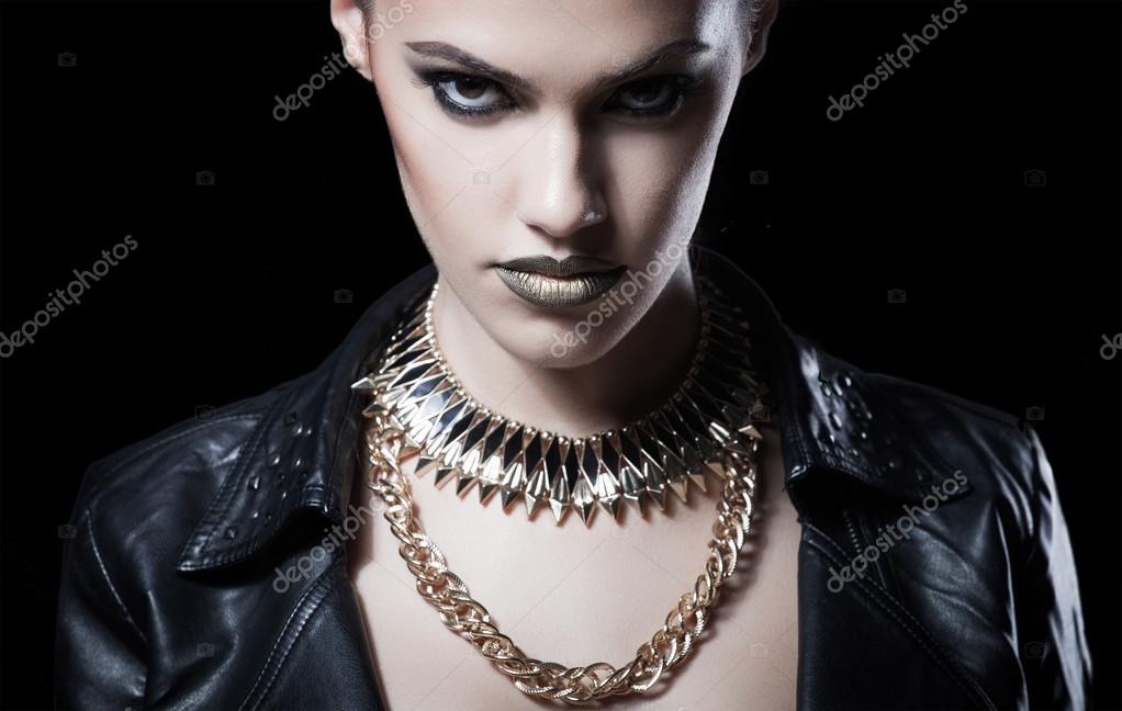 Brutal beautiful sexy woman in a leather clothes Stock Photo by ©margo ...