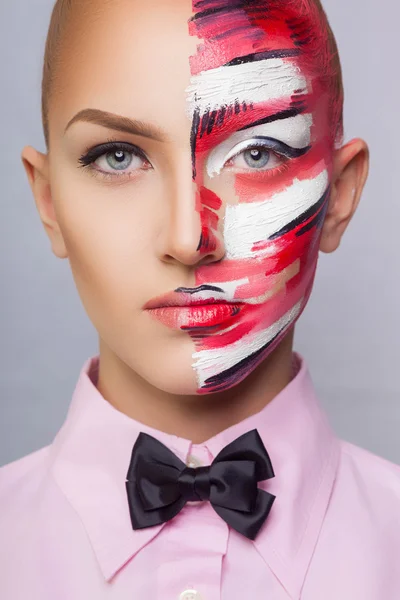 Beautiful fashion woman with bright color face art and body art. Paint on face. Creative portrait — Stock Photo, Image